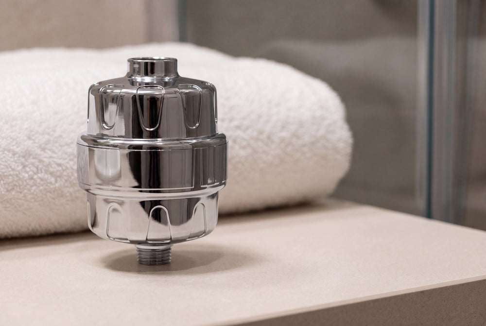 Chrome RinseKind filter beside a folded towel